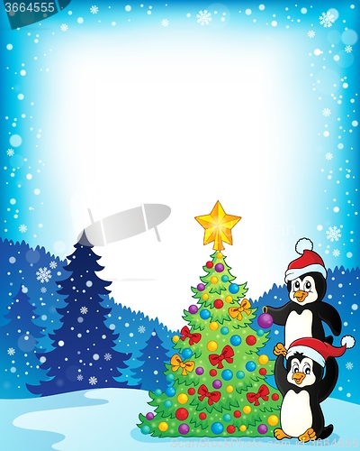 Image of Frame with penguins near Christmas tree