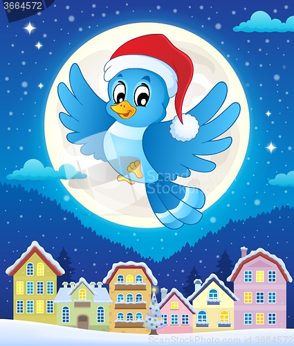 Image of Christmas bird above town