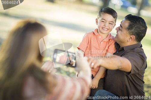 Image of Mixed Race Family Taking A Phone Camera Picture