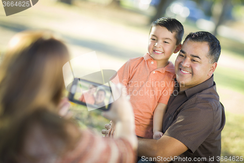 Image of Mixed Race Family Taking A Phone Camera Picture