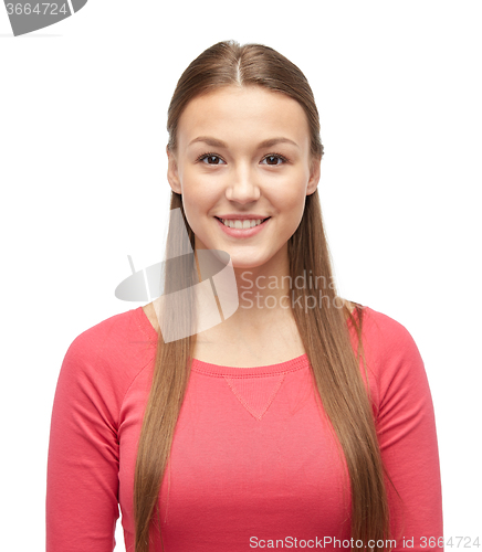 Image of smiling young woman or teenage girl in pullover