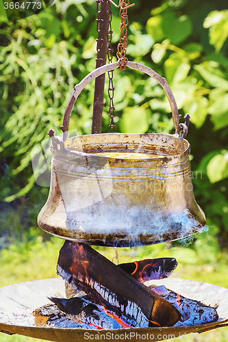 Image of Cauldron with Food