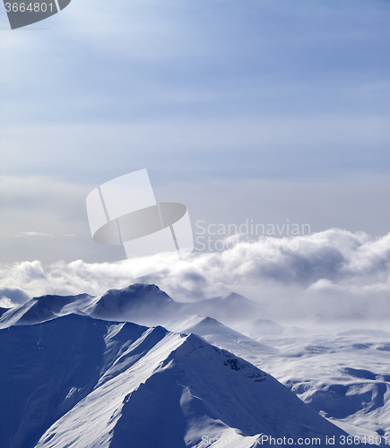 Image of Evening sunlight mountains in cloud