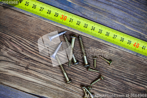 Image of screws and measuring tape