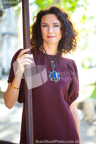 Image of smiling beautiful middle-aged woman