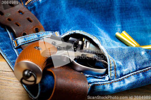 Image of revolver nagant in the pocket