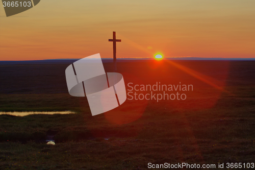 Image of Old, cross, on, backdrop, of, setting, sun., A, night, in, the, Polar, day, Novaya, Zemlya, archipelago., Arctic