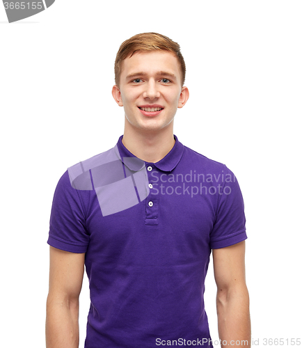Image of smiling young man in purple polo t-shirt