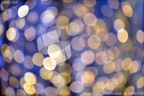 Image of blurred golden lights bokeh