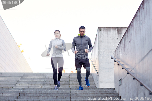 Image of couple walking downstairs on stadium