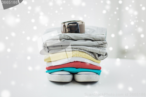 Image of close up of clothes and accessories on table