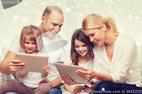 Image of happy family with tablet pc computers