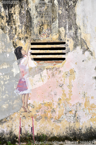 Image of Girl painted by Ernest Zacharevic in Ipoh.