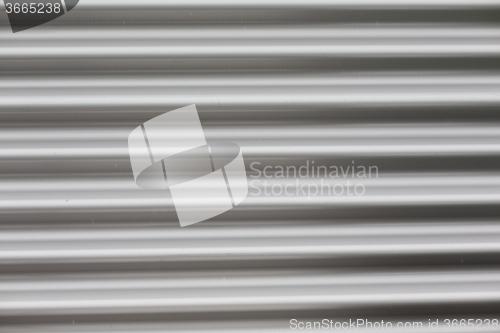 Image of close up of aluminum metal garage door backdrop