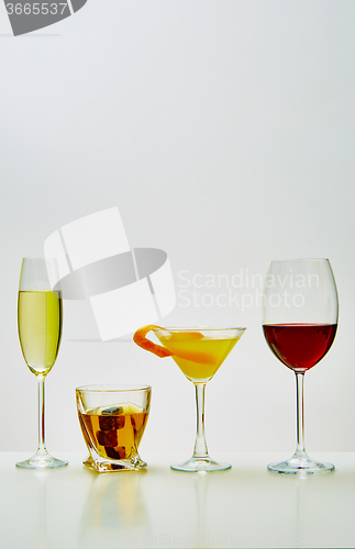 Image of set with different drinks on white background