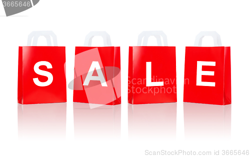 Image of many red shopping bags with sale word