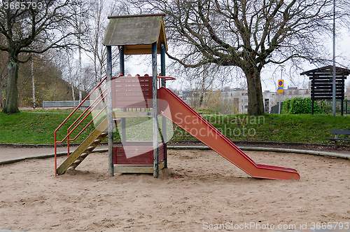 Image of playground in the park with a slide