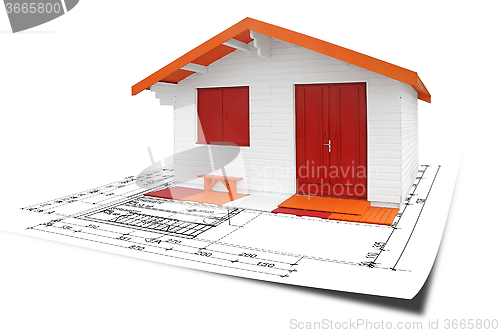 Image of Wooden assembly House with blueprints