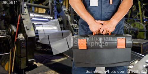 Image of Worker with instruments