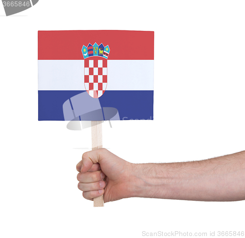 Image of Hand holding small card - Flag of Croatia