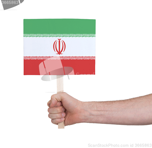 Image of Hand holding small card - Flag of Iran