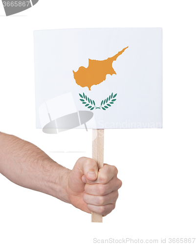 Image of Hand holding small card - Flag of Cyprus