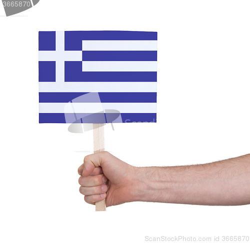 Image of Hand holding small card - Flag of Greece