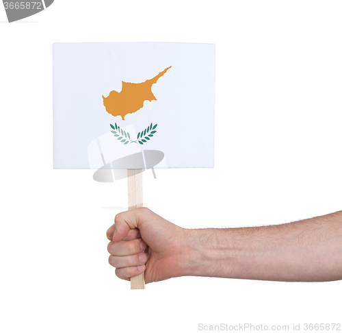 Image of Hand holding small card - Flag of Cyprus