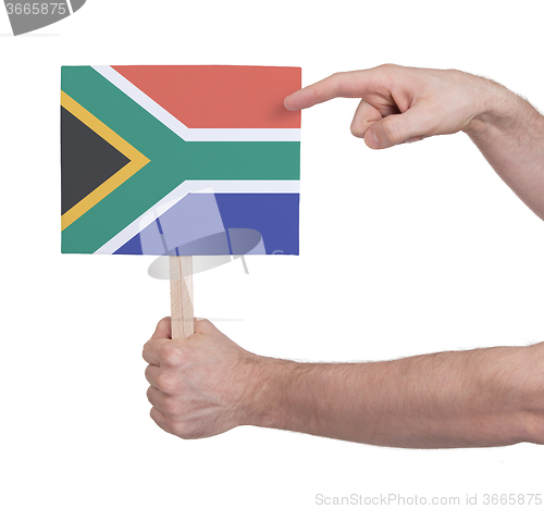 Image of Hand holding small card - Flag of South Africa