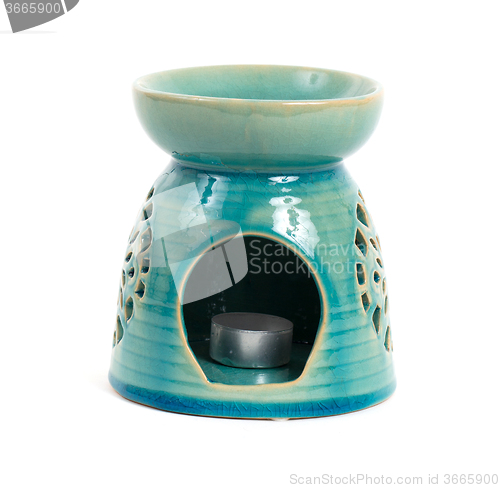 Image of Candle in oil burner