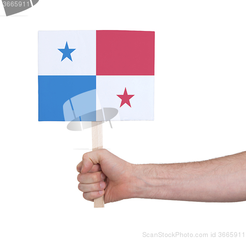 Image of Hand holding small card - Flag of Panama