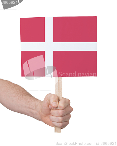 Image of Hand holding small card - Flag of Denmark