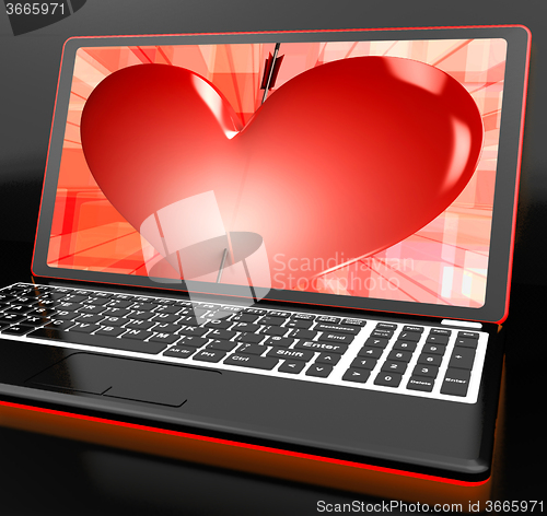 Image of Heart On Laptop Showing Cupid Shot