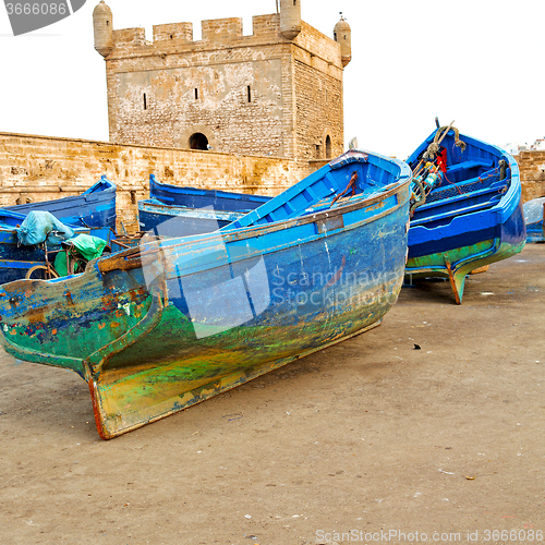 Image of   boat and sea in africa morocco old castle brown brick  sky