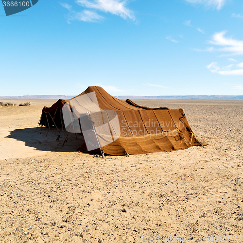 Image of tent in  the desert of morocco sahara and rock  stone    sky