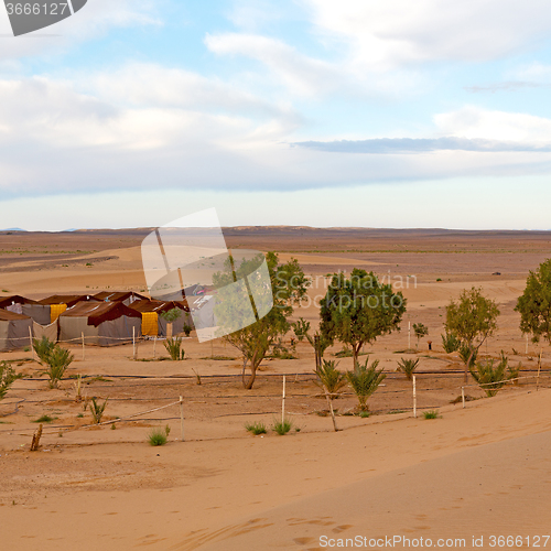 Image of tent in  the desert of morocco sahara and rock  stone    sky