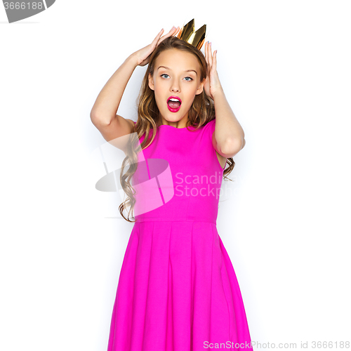 Image of happy young woman or teen girl in pink dress