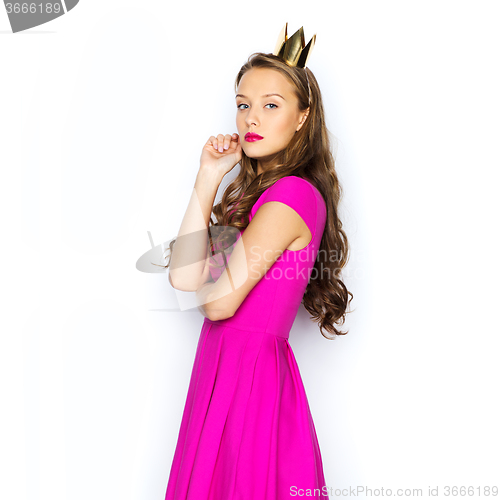Image of young woman or teen girl in pink dress