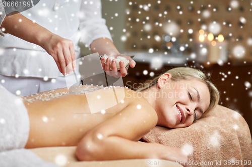 Image of close up of woman lying and having massage in spa