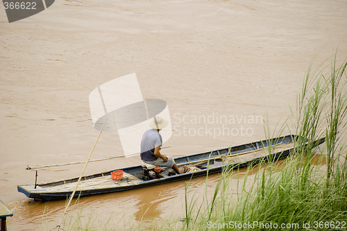 Image of Man in boat