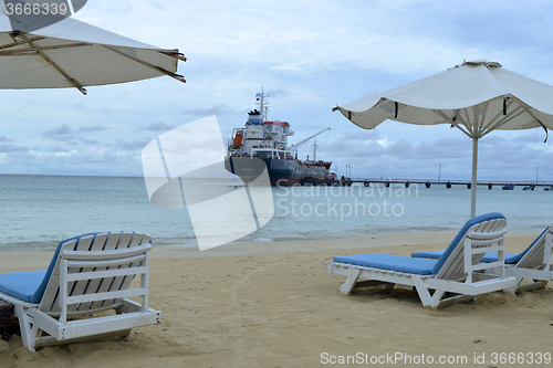 Image of oil tanker transport ship  pier Picnic Center Beach Corn Island,