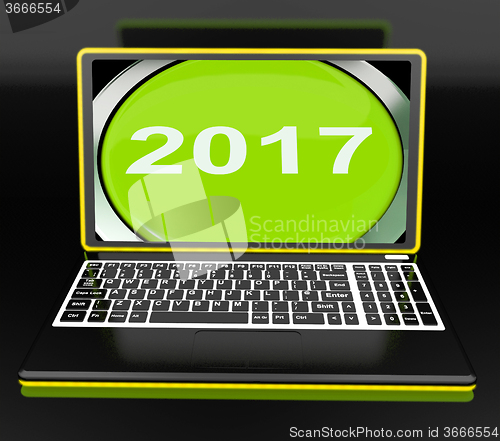 Image of Two Thousand And Seventeen On Laptop Shows New Year 2017