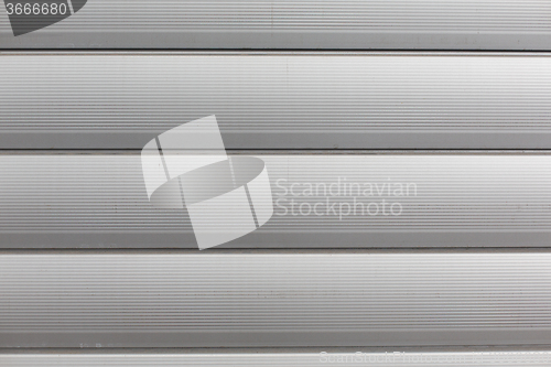 Image of close up of aluminum metal garage door backdrop