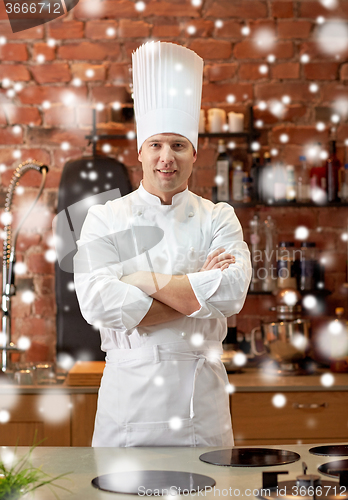 Image of happy male chef cook in restaurant kitchen