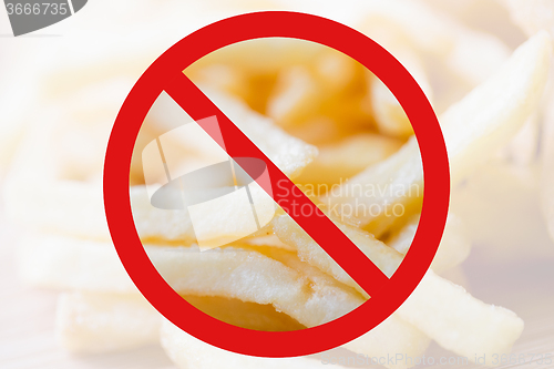 Image of close up of french fries behind no symbol