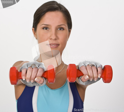 Image of Woman with barbells