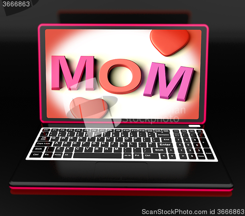 Image of Mom On Laptop Showing Digital Card