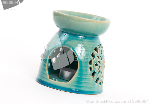 Image of Candle in oil burner