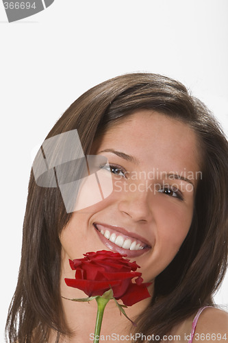 Image of A smile behind a rose