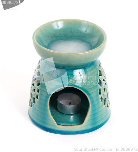 Image of Candle in oil burner